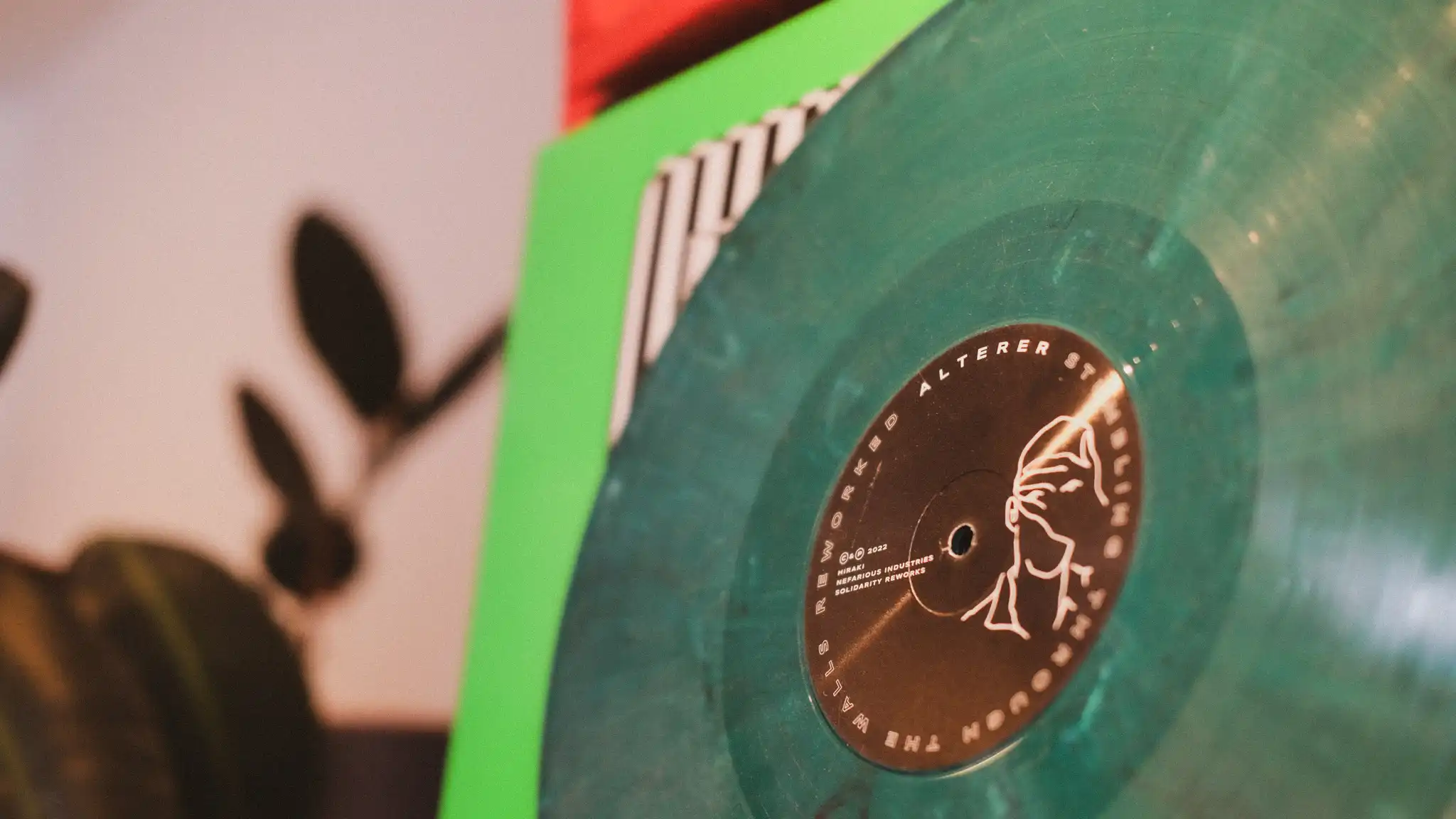 An image of a green record pressed at RPM Records.